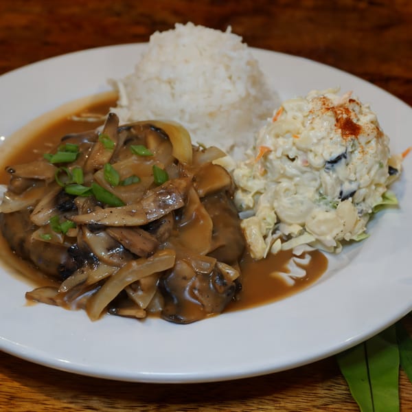 Johnny's Wingz N Tingz Loco Moco with gravy, mushrooms, onions, rice, and macaroni salad.